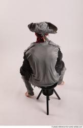 JACK PIRATE SITTING POSE WITH GUN AND DAGGER